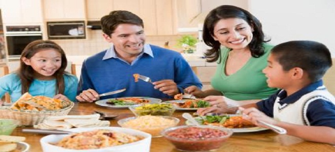 Family having dinner together with kids